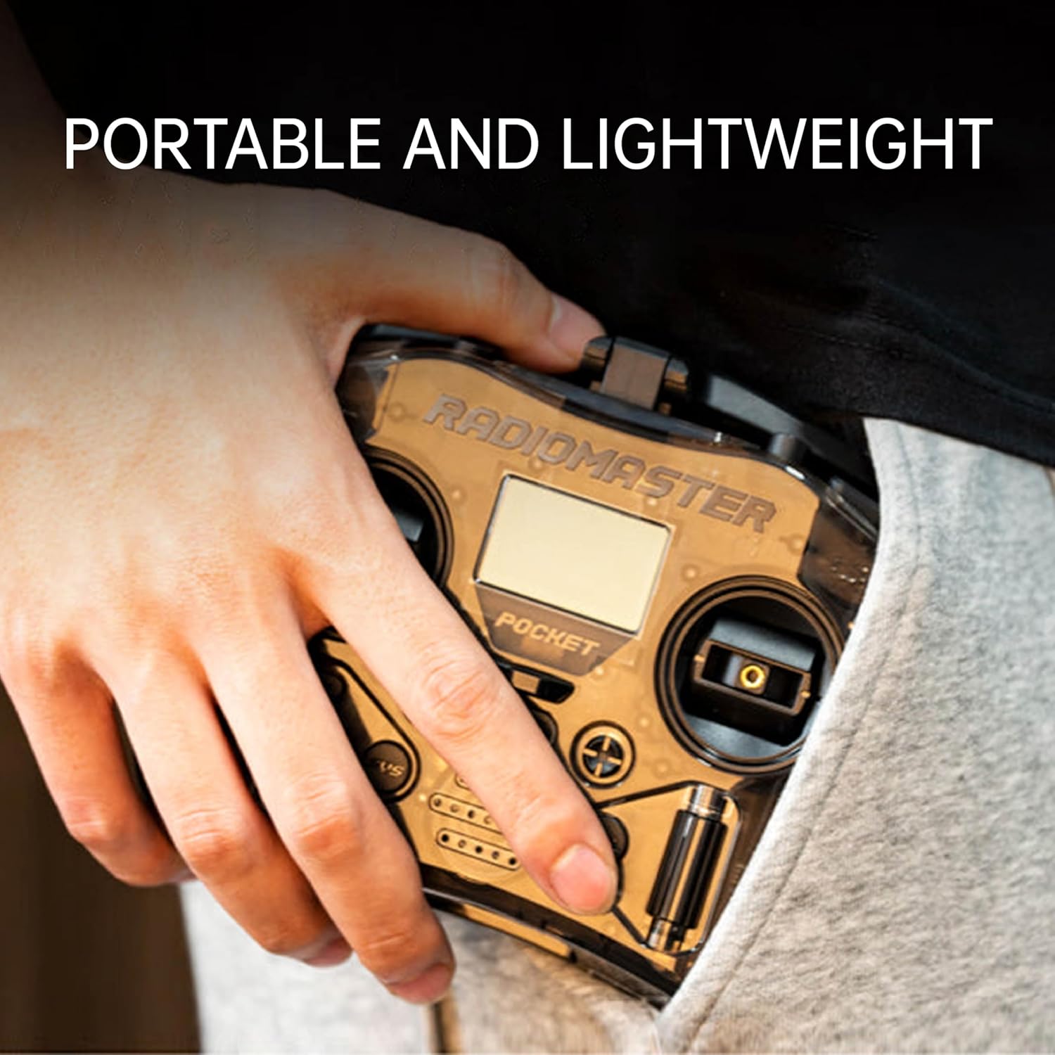 Side view highlighting ergonomic grips and foldable antenna