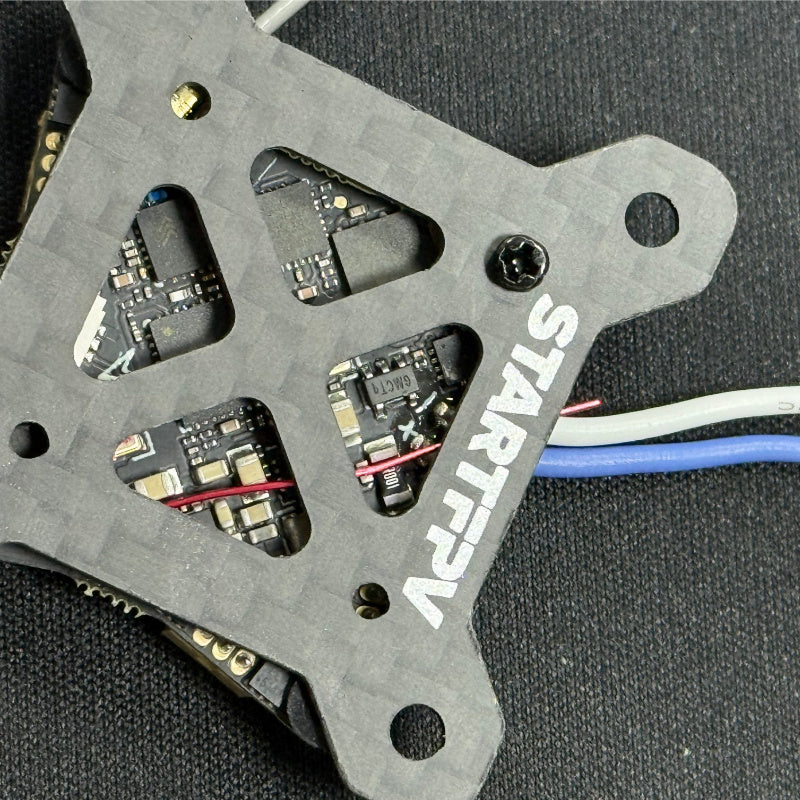 STARTFPV FPV racing drone flight controller board close-up detail, high-performance core circuit & component layout for FPV racing quadcopters