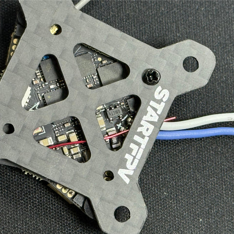STARTFPV FPV racing drone flight controller board close-up detail, high-performance core circuit & component layout for FPV racing quadcopters